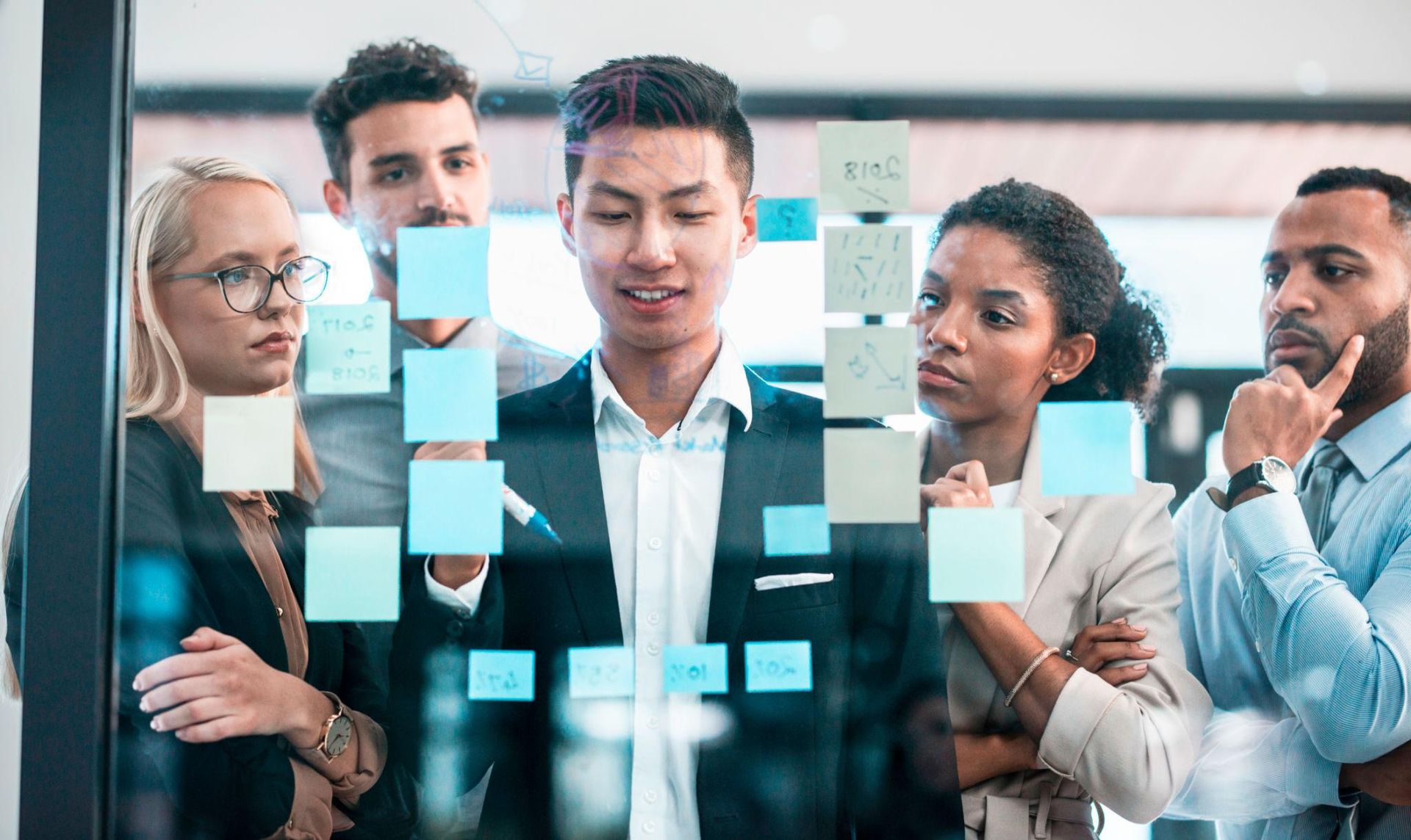 A diverse communications team planning together